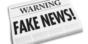 Vector image of newspapers that have big headlines saying: "Warning FAKE NEWS!"